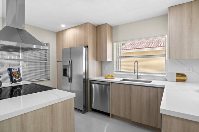 12633 NW 12th Ct, Sunrise, FL 33323 - kitchen with appliances with stainless steel finishes, modern cabinets, wall chimney exhaust hood, a sink, and light brown cabinetry