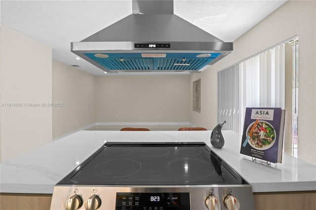 12633 NW 12th Ct, Sunrise, FL 33323 - kitchen with island range hood and stainless steel electric range oven