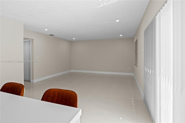 12633 NW 12th Ct, Sunrise, FL 33323 - spare room with recessed lighting, light tile patterned floors, and baseboards