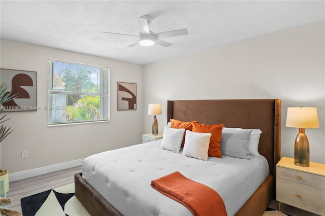 12633 NW 12th Ct, Sunrise, FL 33323 - bedroom featuring wood finished floors, baseboards, and a ceiling fan