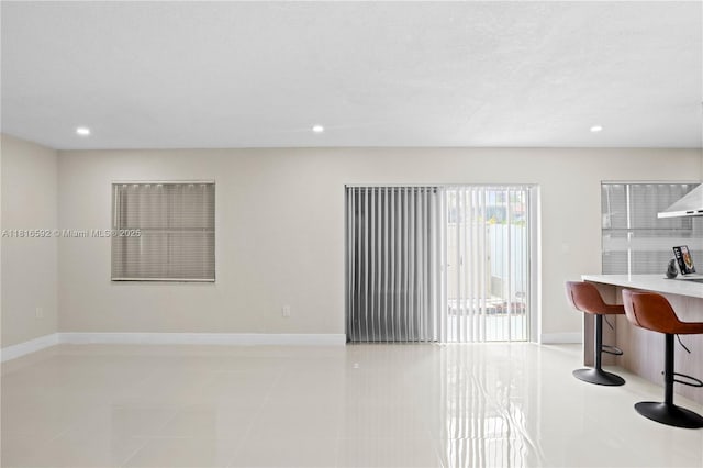 12633 NW 12th Ct, Sunrise, FL 33323 - empty room featuring recessed lighting, baseboards, and light tile patterned floors
