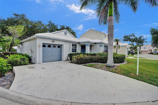 9601 NW 8th Cir, Plantation, FL 33324 - view of front of home with an attached garage, a front yard, driveway, and stucco siding