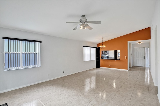 9601 NW 8th Cir, Plantation, FL 33324 - empty room featuring lofted ceiling, a chandelier, a ceiling fan, light tile patterned floors, and baseboards