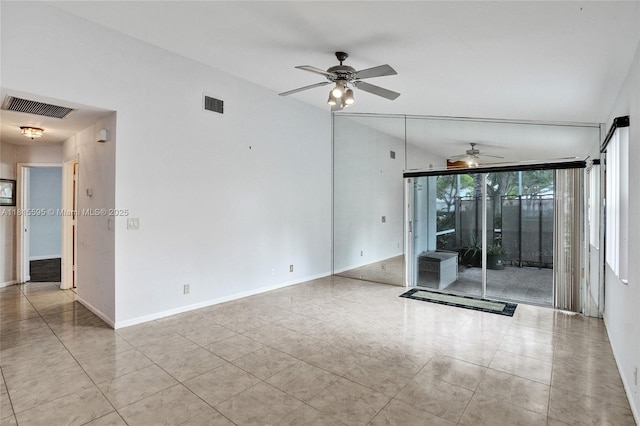 9601 NW 8th Cir, Plantation, FL 33324 - empty room with a ceiling fan, vaulted ceiling, tile patterned floors, and baseboards