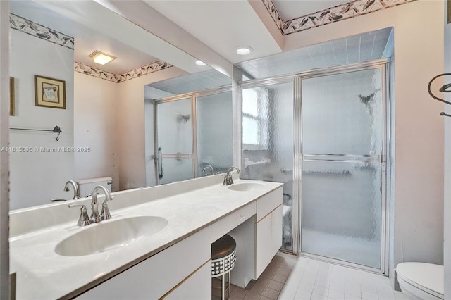 9601 NW 8th Cir, Plantation, FL 33324 - bathroom featuring toilet, double vanity, a shower stall, tile patterned floors, and recessed lighting