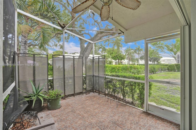 9601 NW 8th Cir, Plantation, FL 33324 - unfurnished sunroom with ceiling fan