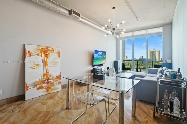 3029 NE 188th St Unit 821, Aventura, FL 33180 - office area with a chandelier and wood finished floors
