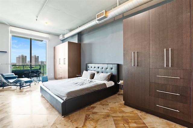 3029 NE 188th St Unit 821, Aventura, FL 33180 - bedroom with access to exterior and a view of city