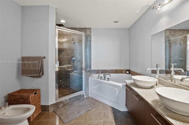 3029 NE 188th St Unit 821, Aventura, FL 33180 - bathroom with a shower stall, a garden tub, a bidet, double vanity, and tile patterned floors