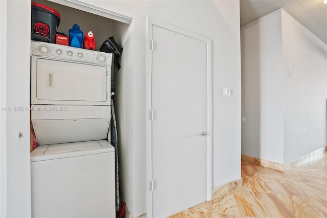 3029 NE 188th St Unit 821, Aventura, FL 33180 - laundry room with stacked washer / dryer and marble look tiles