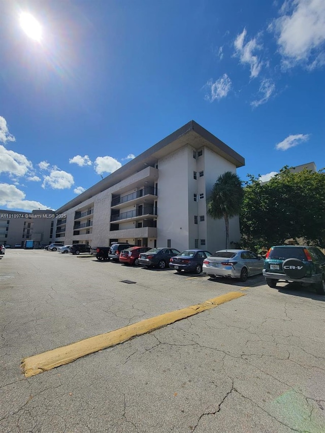 870 NW 87th Ave Unit 310, Miami, FL 33172 - view of apartment building / complex with uncovered parking