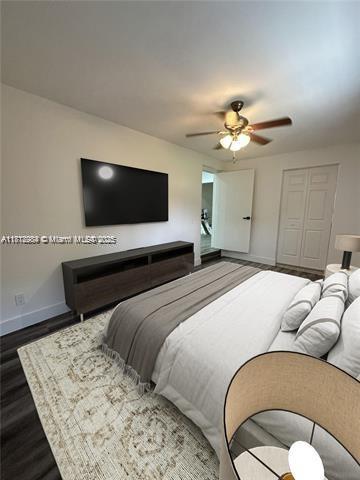280 NE 169th St, North Miami Beach, FL 33162 - bedroom with wood finished floors, a ceiling fan, and a closet