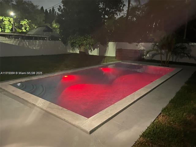 280 NE 169th St, North Miami Beach, FL 33162 - view of swimming pool with a fenced backyard
