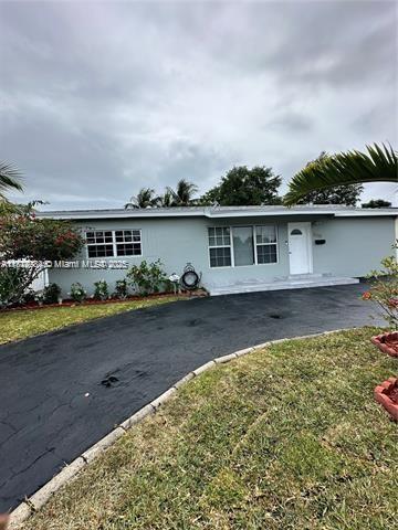 280 NE 169th St, North Miami Beach, FL 33162 - view of ranch-style house