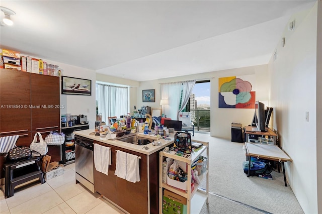 1900 N Bayshore Dr Unit 1411, Miami, FL 33132 - kitchen featuring stainless steel dishwasher, a sink, and light tile patterned flooring