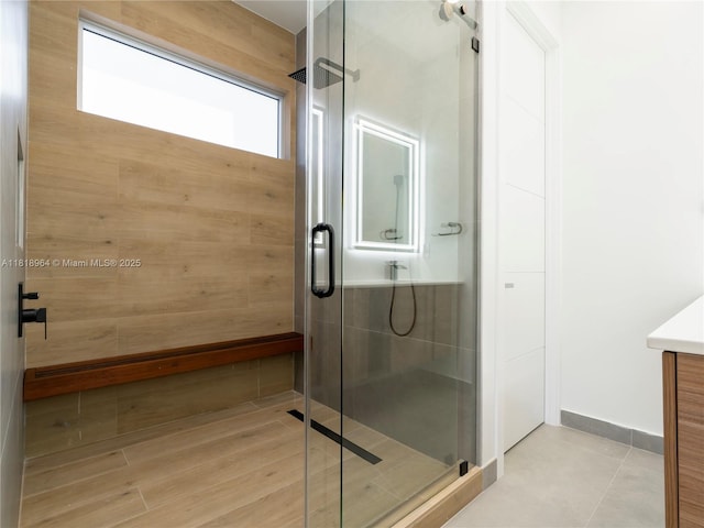 1421 SW 24th Ct Unit 4, Fort Lauderdale, FL 33315 - full bathroom with vanity, a shower stall, and tile patterned flooring
