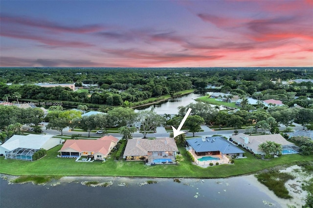 18366 Lake Bend Dr, Jupiter, FL 33458 - aerial view at dusk of a water view and a residential view