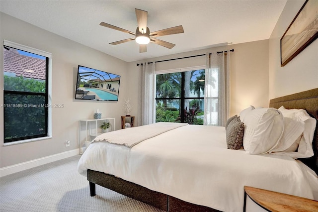18366 Lake Bend Dr, Jupiter, FL 33458 - bedroom featuring carpet and a ceiling fan