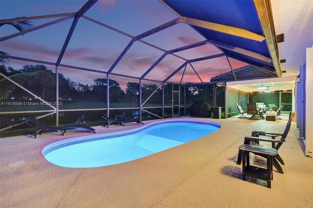 18366 Lake Bend Dr, Jupiter, FL 33458 - outdoor pool featuring a patio, a water view, ceiling fan, a grill, and a lanai