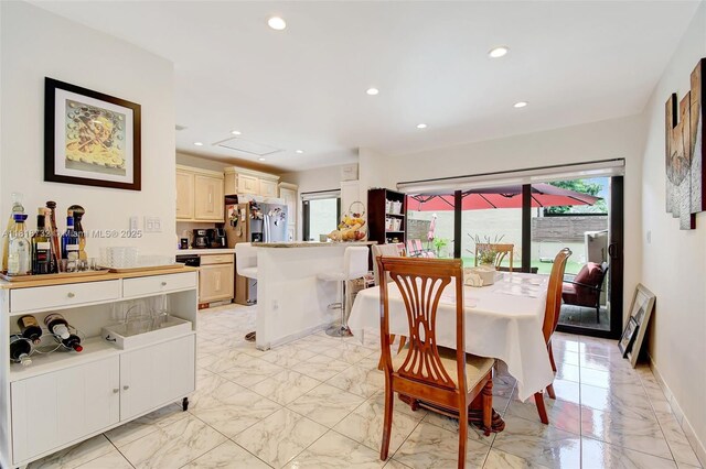 1057 NE 202nd Ln, Miami, FL 33179 - dining space with light marble finish floors and recessed lighting