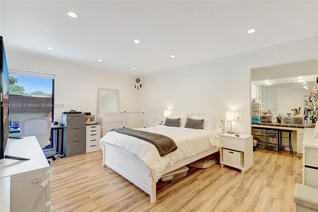 1057 NE 202nd Ln, Miami, FL 33179 - bedroom featuring light wood-style floors and recessed lighting