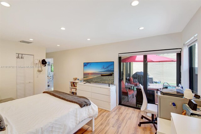1057 NE 202nd Ln, Miami, FL 33179 - bedroom featuring light wood-type flooring, recessed lighting, and a closet