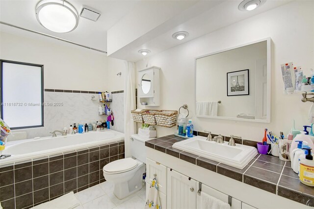 1057 NE 202nd Ln, Miami, FL 33179 - full bath featuring tile patterned floors, a bath, vanity, and toilet
