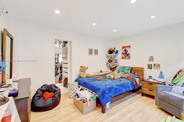 1057 NE 202nd Ln, Miami, FL 33179 - bedroom with wood finished floors, recessed lighting, a spacious closet, and a closet