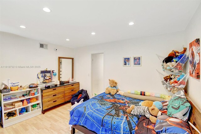 1057 NE 202nd Ln, Miami, FL 33179 - bedroom featuring light wood-style floors and recessed lighting