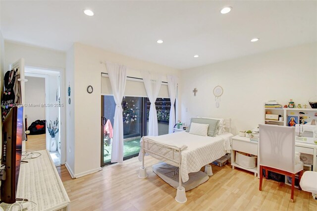 1057 NE 202nd Ln, Miami, FL 33179 - bedroom featuring light wood-style flooring and recessed lighting