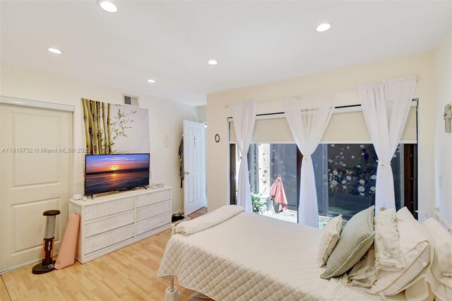 1057 NE 202nd Ln, Miami, FL 33179 - bedroom featuring wood finished floors and recessed lighting