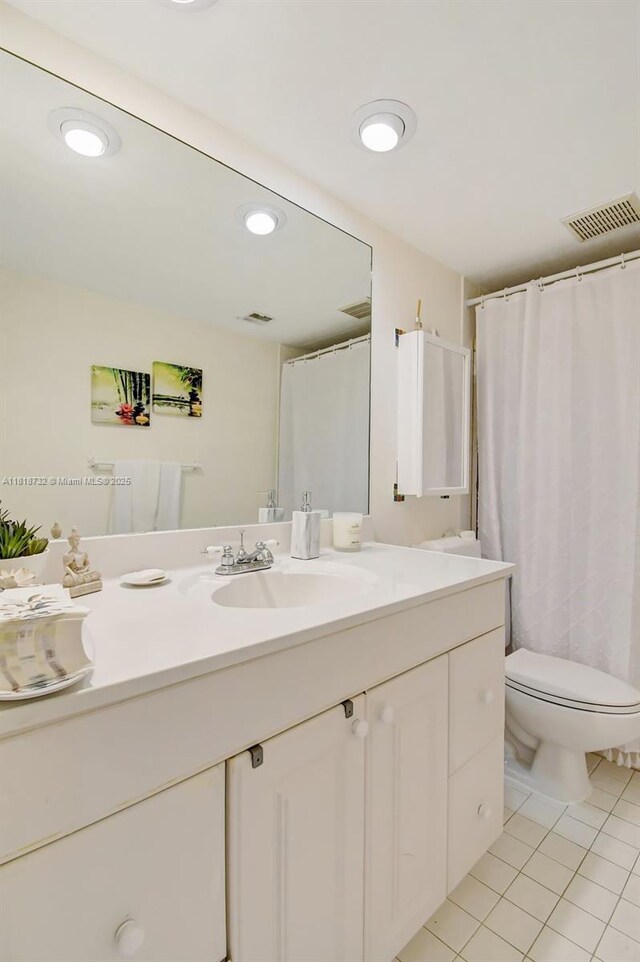 1057 NE 202nd Ln, Miami, FL 33179 - bathroom featuring tile patterned flooring, vanity, toilet, recessed lighting, and curtained shower