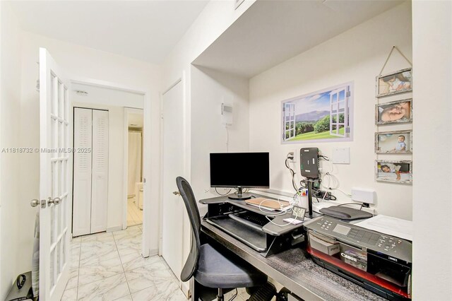 1057 NE 202nd Ln, Miami, FL 33179 - home office with light marble finish flooring