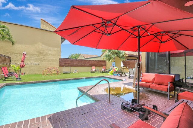 1057 NE 202nd Ln, Miami, FL 33179 - swimming pool with a patio area and outdoor lounge area