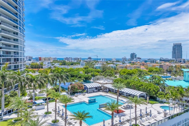 400 Alton Rd Unit 407, Miami Beach, FL 33139 - community pool with a patio area, a community hot tub, and a city view
