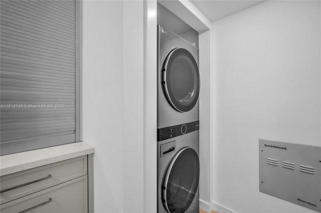 400 Alton Rd Unit 407, Miami Beach, FL 33139 - washroom with stacked washer / drying machine