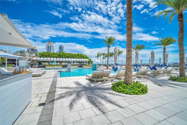 400 Alton Rd Unit 407, Miami Beach, FL 33139 - community pool featuring a patio area