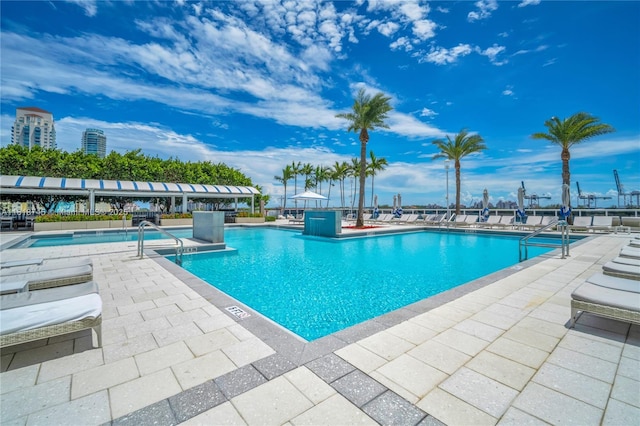 400 Alton Rd Unit 407, Miami Beach, FL 33139 - community pool featuring a patio