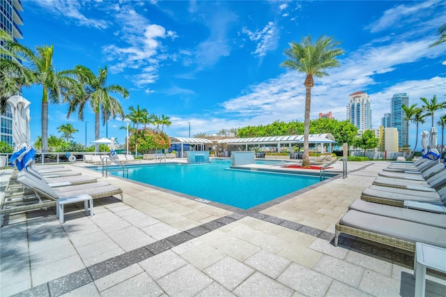 400 Alton Rd Unit 407, Miami Beach, FL 33139 - community pool featuring a patio area