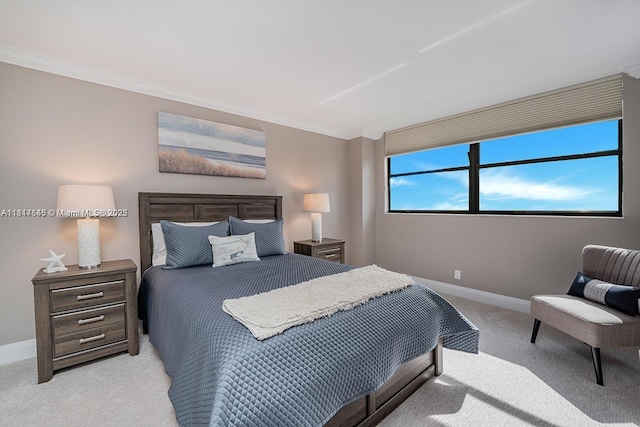2900 NE 14th St Cswy Unit 410, Pompano Beach, FL 33062 - bedroom with light carpet, crown molding, and baseboards