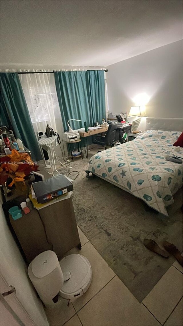 215 SE 3rd Ave Unit 106C, Hallandale Beach, FL 33009 - bedroom featuring tile patterned flooring
