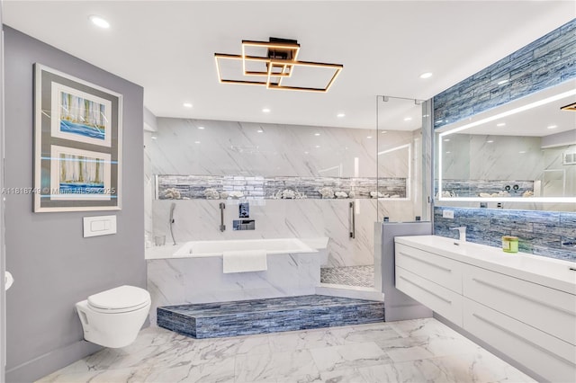 3015 N Ocean Blvd Unit 17A, Fort Lauderdale, FL 33308 - bathroom featuring vanity, a bath, marble finish floors, recessed lighting, and a marble finish shower