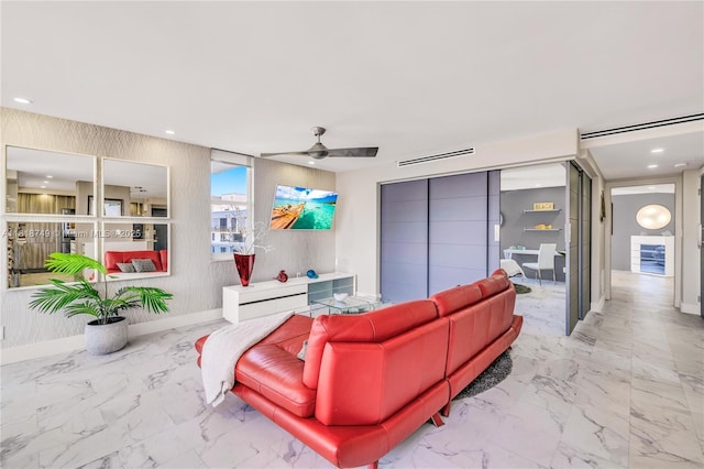 3015 N Ocean Blvd Unit 17A, Fort Lauderdale, FL 33308 - living area featuring marble look tiles, recessed lighting, and a ceiling fan