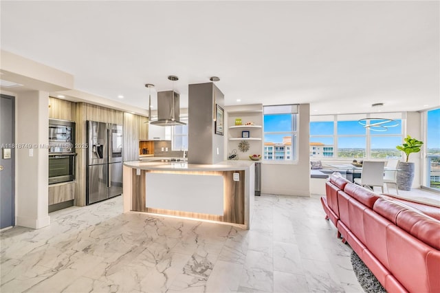 3015 N Ocean Blvd Unit 17A, Fort Lauderdale, FL 33308 - kitchen featuring stainless steel appliances, exhaust hood, open floor plan, modern cabinets, and light countertops