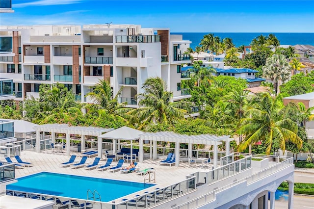 3015 N Ocean Blvd Unit 17A, Fort Lauderdale, FL 33308 - community pool featuring a pergola, a water view, and a patio area