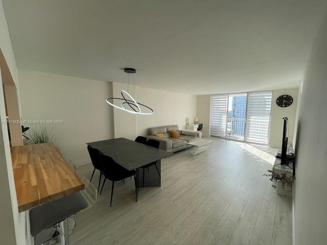 2801 NE 183rd St Unit 1611W, Aventura, FL 33160 - dining space featuring light wood-style floors