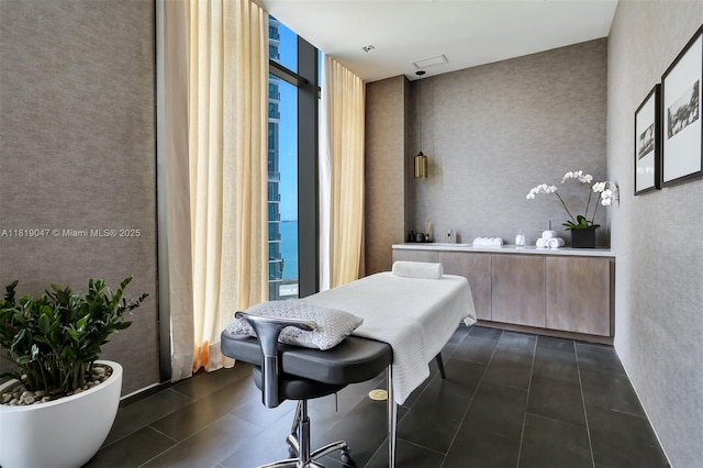 480 NE 31st St Unit Ph5303, Miami, FL 33137 - bedroom with dark tile patterned floors