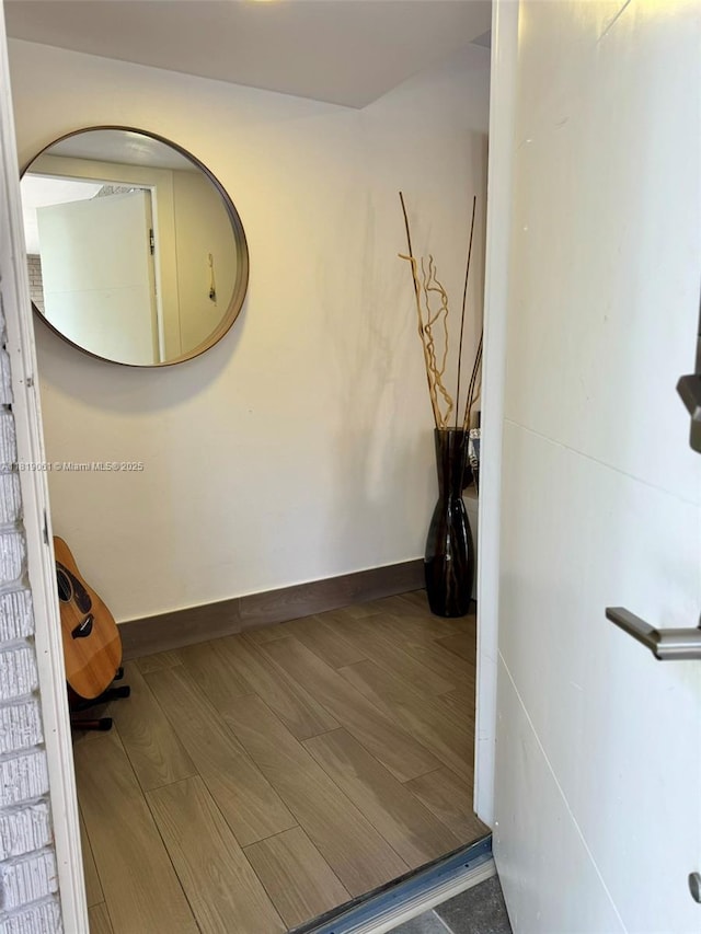 7650 SW 78th Ct, Miami, FL 33143 - hallway with wood finished floors and baseboards