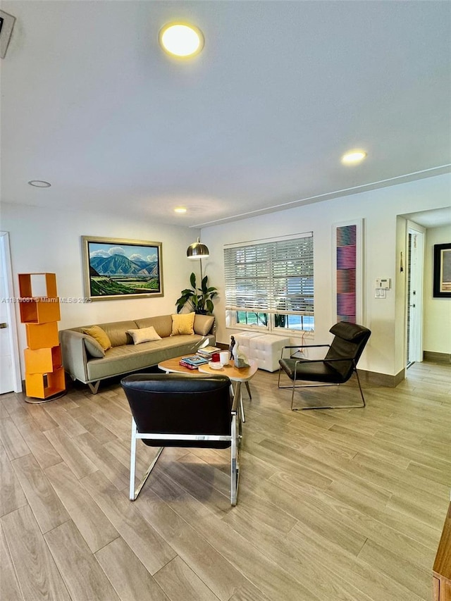 7650 SW 78th Ct, Miami, FL 33143 - living area with light wood finished floors and recessed lighting