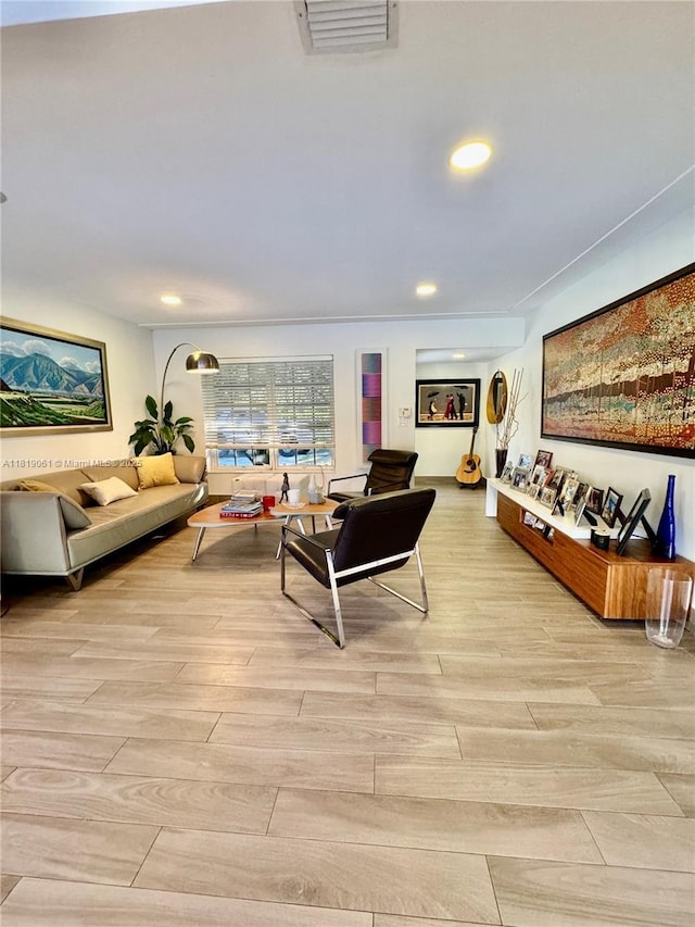 7650 SW 78th Ct, Miami, FL 33143 - living room with light wood-type flooring and recessed lighting